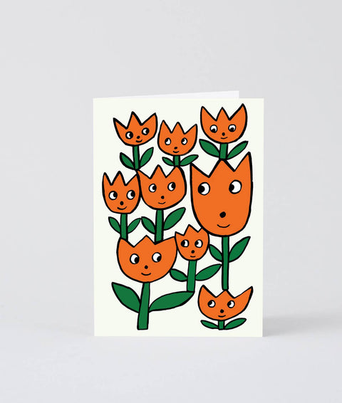 Klappkarte mit lächelnden Blumen